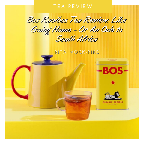 Yellow and red tea pot on yellow background with clear tea cup and tin of Bos rooibos tea