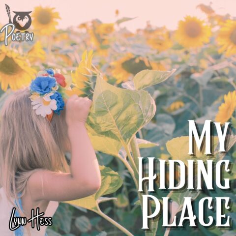 A young child with long blonde hair stands among tall sunflower plants, lifting a large green leaf to look beneath it. The child wears a colorful flower headband with blue, white, and yellow blossoms, surrounded by bright yellow sunflowers filling the background. sunflowers TEXT: My Hiding Place, Lynn Hess, Poetry