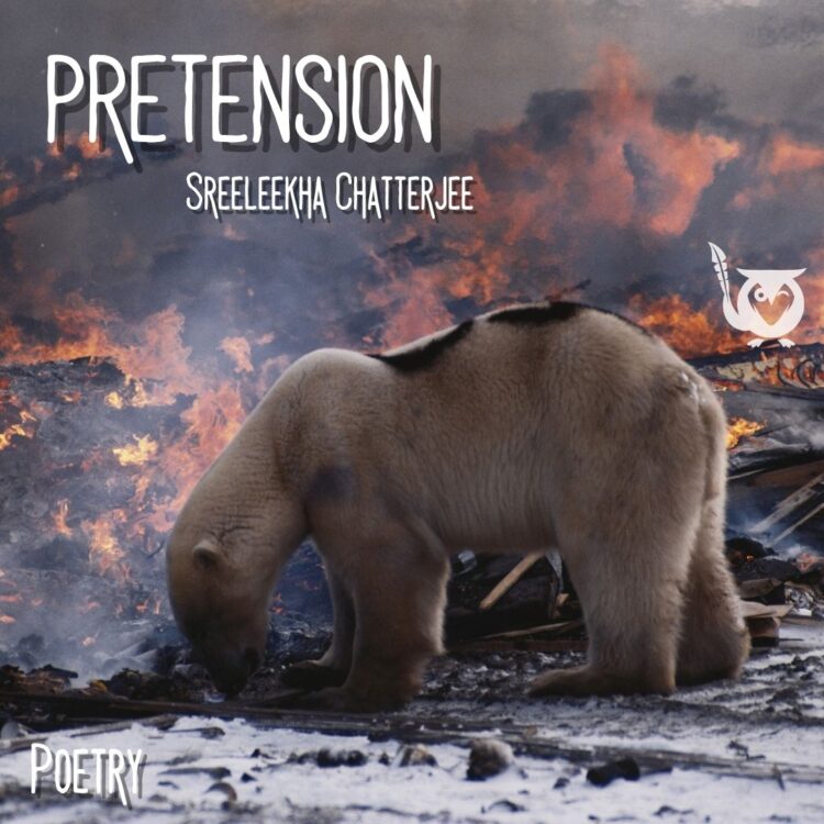 A lone polar bear stands with its head lowered among charred debris while flames and thick smoke rise behind it, casting an orange glow across the ruined landscape. The scene feels heavy and unsettling, like a stark reminder of loss and the fragile balance between nature and destruction. Habitat TEXT: Pretension, Sreeleekha Chatterjee, Poetry