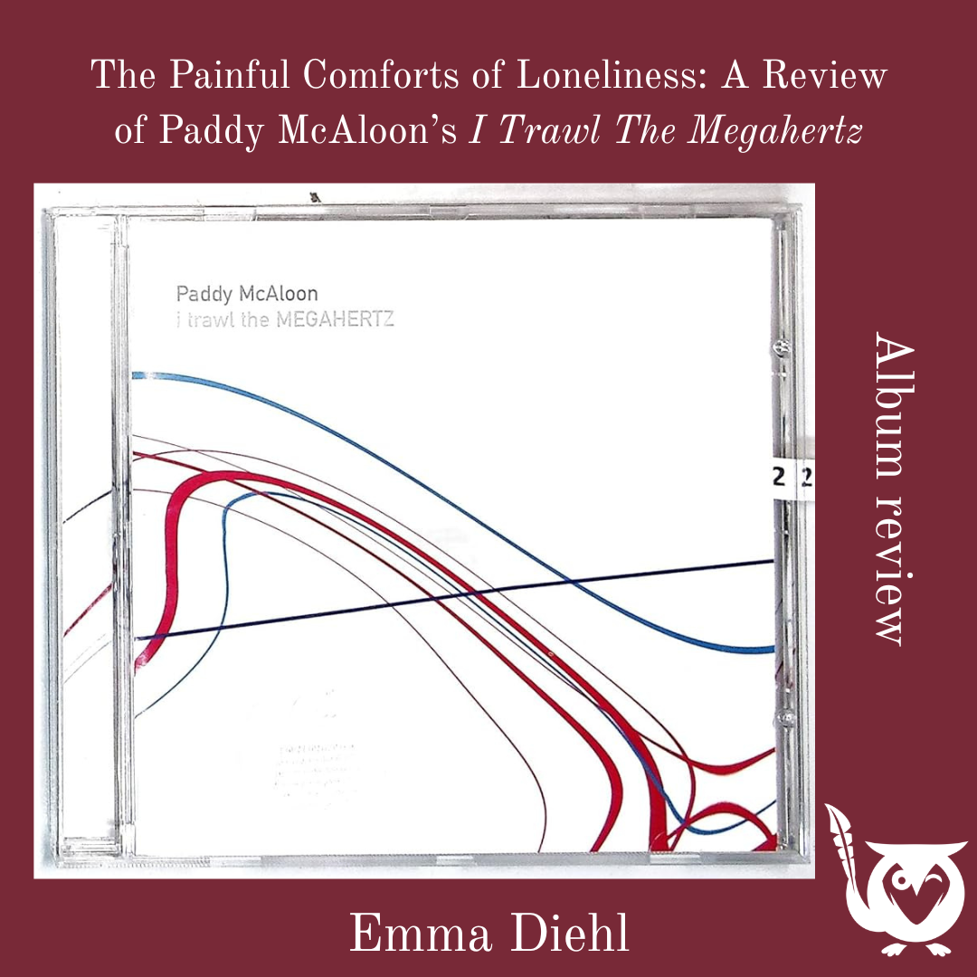 A CD case displaying the album I Trawl the Megahertz by Paddy McAloon sits centered against a deep maroon background. The cover features minimalist curved lines in red, blue, and black across a white field. Text above reads “The Painful Comforts of Loneliness: A Review of Paddy McAloon’s I Trawl the Megahertz,” with “Album Review” along the side and the MockingOwl Roost owl logo in the bottom right corner. I Trawl the Megahertz TEXT: The Painful Comforts of Loneliness: A Review of Paddy McAloon’s I Trawl the Megahertz, Emma Diehl