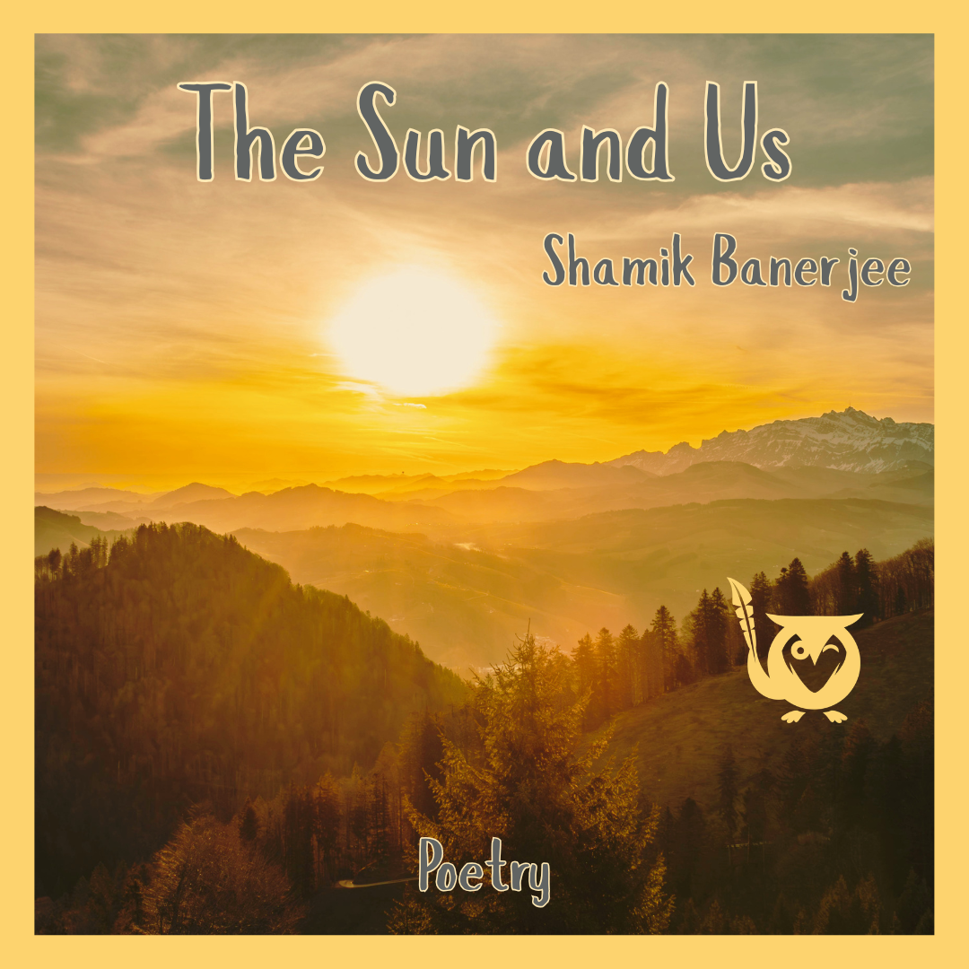 The sun hangs low above layered mountain ranges, casting golden light across rolling hills and forested slopes. Dark evergreen trees fill the foreground, while distant peaks fade into hazy layers beneath a warm yellow sky. homestead TEXT: The Sun and Us, Shamik Banerjee, Poetry